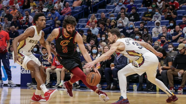 Dec 28, 2021; New Orleans, Louisiana, USA;  New Orleans Pelicans guard Tomas Satoransky (31) knocks the ball away from Cleveland Cavaliers guard Ricky Rubio (3) during the first half  at Smoothie King Center. Mandatory Credit: Stephen Lew-USA TODAY Sports