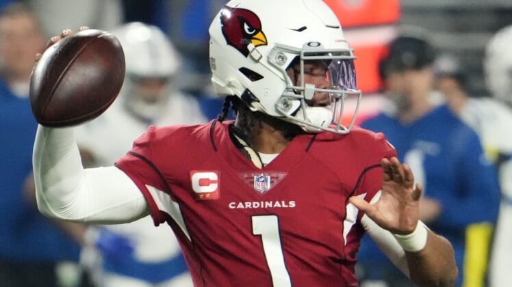Dec 25, 2021; Glendale, Arizona, USA; Arizona Cardinals quarterback Kyler Murray (1) throws a pass against the Indianapolis Colts in the first half at State Farm Stadium.Nfl Indianapolis Colts At Arizona Cardinals