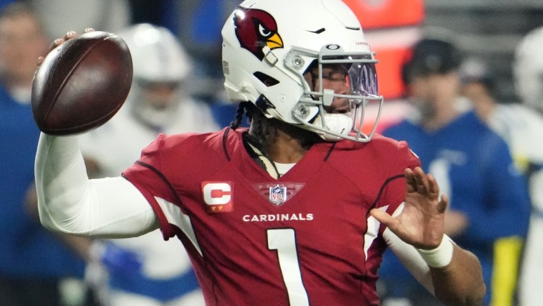 Dec 25, 2021; Glendale, Arizona, USA; Arizona Cardinals quarterback Kyler Murray (1) throws a pass against the Indianapolis Colts in the first half at State Farm Stadium.

Nfl Indianapolis Colts At Arizona Cardinals