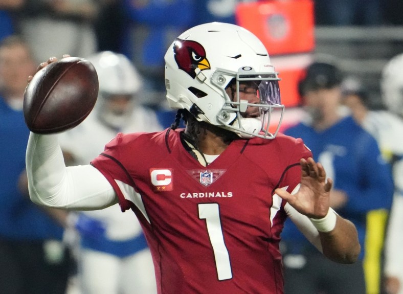 Dec 25, 2021; Glendale, Arizona, USA; Arizona Cardinals quarterback Kyler Murray (1) throws a pass against the Indianapolis Colts in the first half at State Farm Stadium.

Nfl Indianapolis Colts At Arizona Cardinals