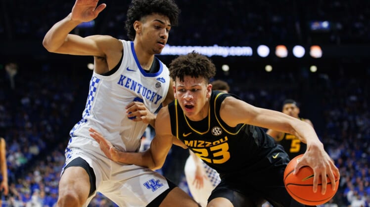 Dec 29, 2021; Lexington, Kentucky, USA; Missouri Tigers forward Trevon Brazile (23) drives to the basket against Kentucky Wildcats forward Jacob Toppin (0) during the first half at Rupp Arena at Central Bank Center. Mandatory Credit: Jordan Prather-USA TODAY Sports