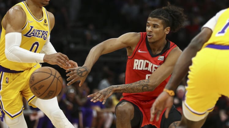 Dec 28, 2021; Houston, Texas, USA; Houston Rockets guard Jalen Green (0) passes the ball during the game against the Los Angeles Lakers at Toyota Center. Mandatory Credit: Troy Taormina-USA TODAY Sports