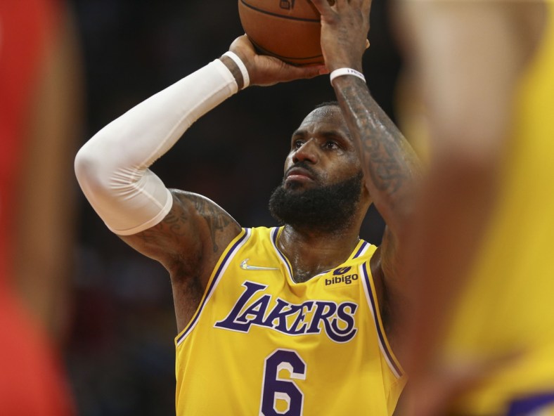 Dec 28, 2021; Houston, Texas, USA; Los Angeles Lakers forward LeBron James (6) attempts a free throw during the game against the Houston Rockets at Toyota Center. Mandatory Credit: Troy Taormina-USA TODAY Sports