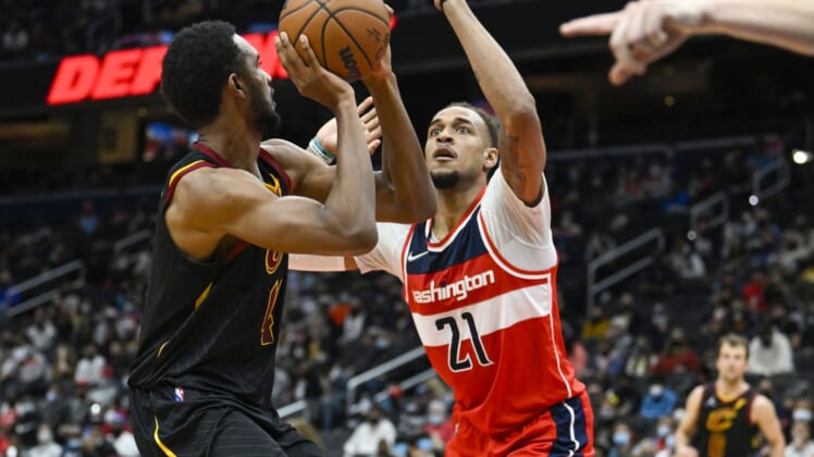 Dec 30, 2021; Washington, District of Columbia, USA; Washington Wizards center Daniel Gafford (21) defends Cleveland Cavaliers center Evan Mobley (4) during the first half at Capital One Arena. Mandatory Credit: Brad Mills-USA TODAY Sports