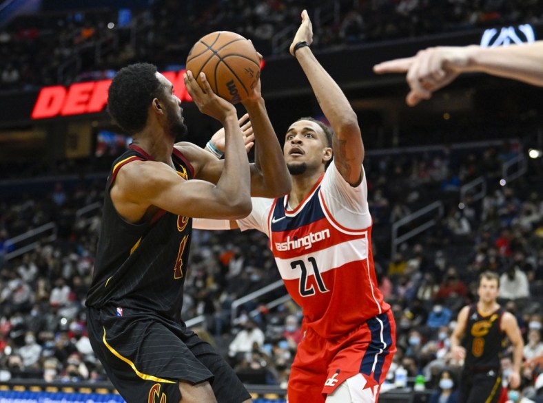 Dec 30, 2021; Washington, District of Columbia, USA; Washington Wizards center Daniel Gafford (21) defends Cleveland Cavaliers center Evan Mobley (4) during the first half at Capital One Arena. Mandatory Credit: Brad Mills-USA TODAY Sports