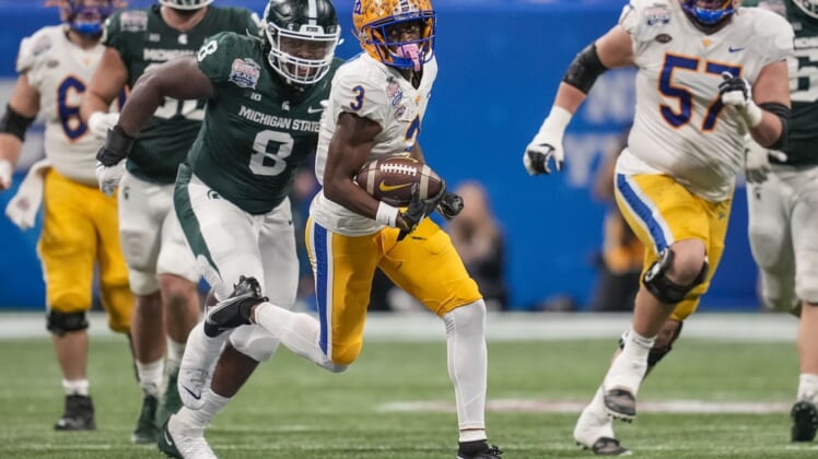 Dec 30, 2021; Atlanta, GA, USA; Pittsburgh Panthers wide receiver Jordan Addison (3) runs with the ball after a catch against the Michigan State Spartans during the first half during the 2021 Peach Bowl at Mercedes-Benz Stadium. Mandatory Credit: Dale Zanine-USA TODAY Sports