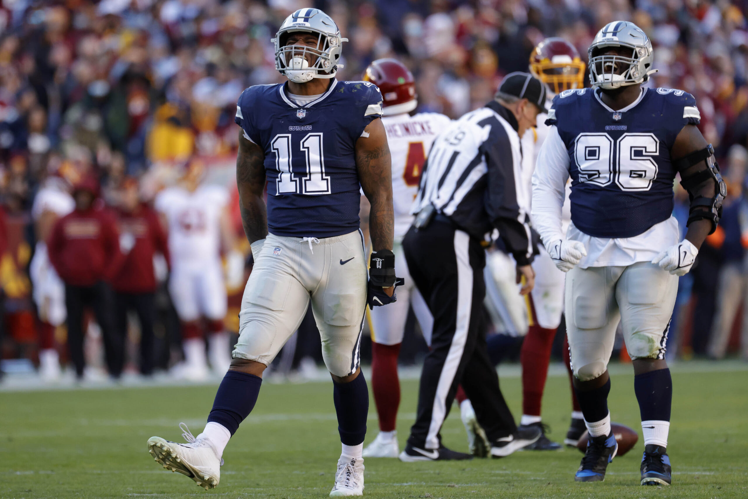 Prescott, Cowboys clobber Washington, clinch NFC East title 