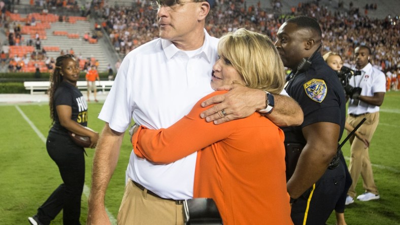 Auburn head coach Gus Malzahn hugs his wife, Kristi, after the game at Jordan-Hare Stadium in Auburn, Ala., on Saturday, Sept. 8, 2018. Auburn defeated Alabama State 63-9. 

Jc Auburnasu 63