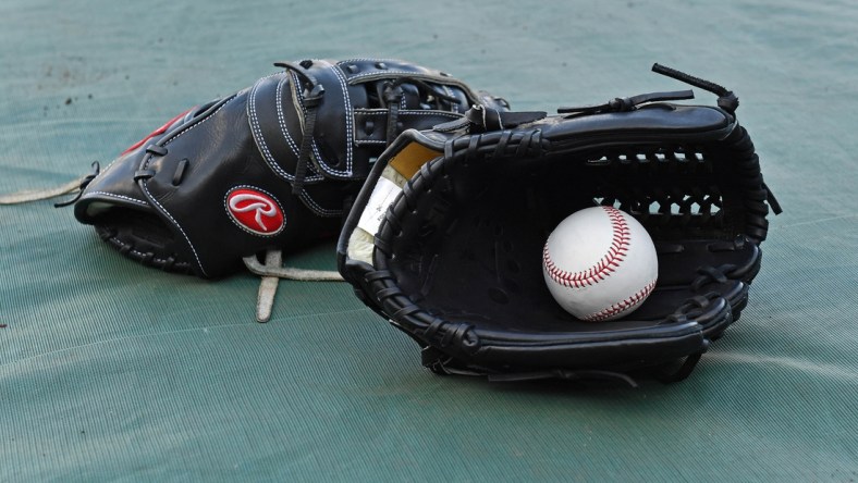 Sep 14, 2018; Kansas City, MO, USA; A general view of a baseball and glove, prior to a game between the Kansas City Royals and Minnesota Twins at Kauffman Stadium. Mandatory Credit: Peter G. Aiken/USA TODAY Sports