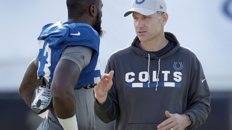 Indianapolis Colts defensive coordinator Matt Eberflus talks with linebacker Darius Leonard (53) during the Colts training camp at Grand Park in Westfield on Monday, August 6, 2018.

Indianapolis Colts Training Camp At Grand Park In Westfield