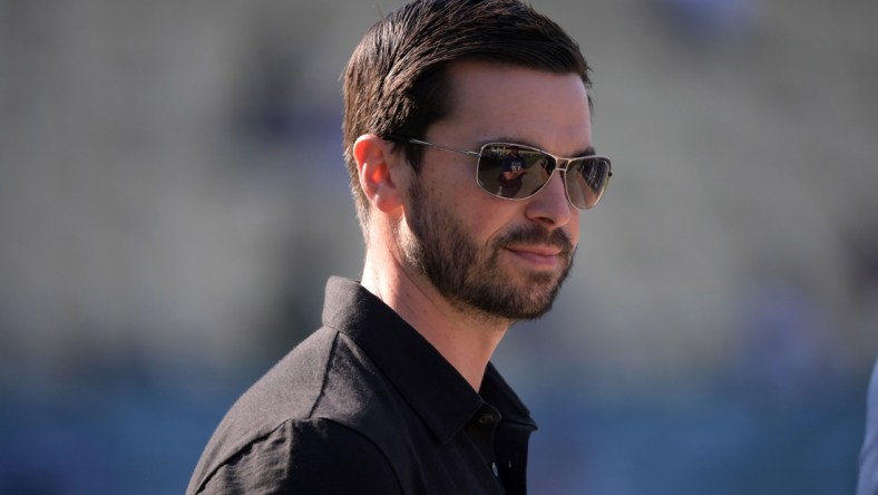 Jul 6, 2019; Los Angeles, CA, USA; Los Angeles Dodgers assistant general manager Brandon Gomes reacts before the game against the San Diego Padres at Dodger Stadium. The Padres defeated the Dodgers 3-1. Mandatory Credit: Kirby Lee-USA TODAY Sports