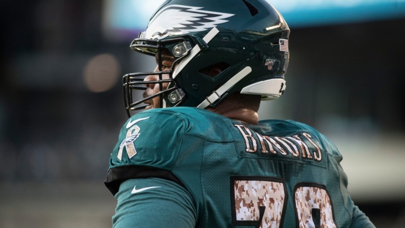 Eagles' Brandon Brooks (79) warms up during open practice Sunday night at Lincoln Financial Field. 

Sports Eagles Open Practice