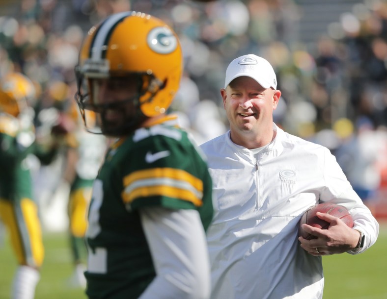 Green Bay Packers offensive coordinator Nathaniel Hackett talks with quarterback Aaron Rodgers (12) before their game against the Oakland Raiders Sunday, October 21, 2019 at Lambeau Field in Green Bay, Wis.MARK HOFFMAN/MILWAUKEE JOURNAL SENTINEL

Packers21 1 Hoffman
