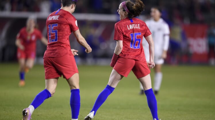 Feb 7, 2020; Los Angeles, California, USA; United States midfielder Rose Lavelle (16) celebrates after scoring a goal with forward Megan Rapinoe (15) against Mexico during the first half of the CONCACAF Women's Olympic Qualifying soccer tournament at Dignity Health Sports Park. Mandatory Credit: Kelvin Kuo-USA TODAY Sports