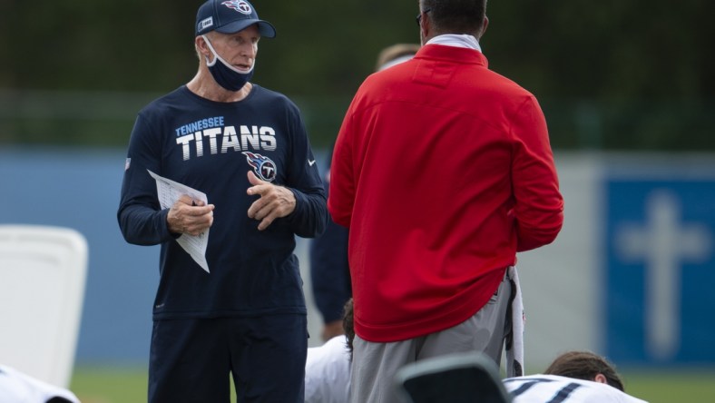 Sep 3, 2020; Nashville, TN, USA; Tennessee Titans inside linebackers coach Jim Haslett talks with head coach    Mike Vrabel during practice at Saint Thomas Sports Park Mandatory Credit: George Walker IV/The Tennessean via USA TODAY NETWORK