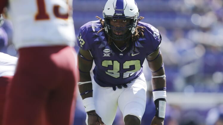 Sep 26, 2020; Fort Worth, Texas, USA; TCU Horned Frogs defensive end Ochaun Mathis (32) on the line of scrimmage in the third quarter against the Iowa State Cyclones at Amon G. Carter Stadium. Mandatory Credit: Tim Heitman-USA TODAY Sports