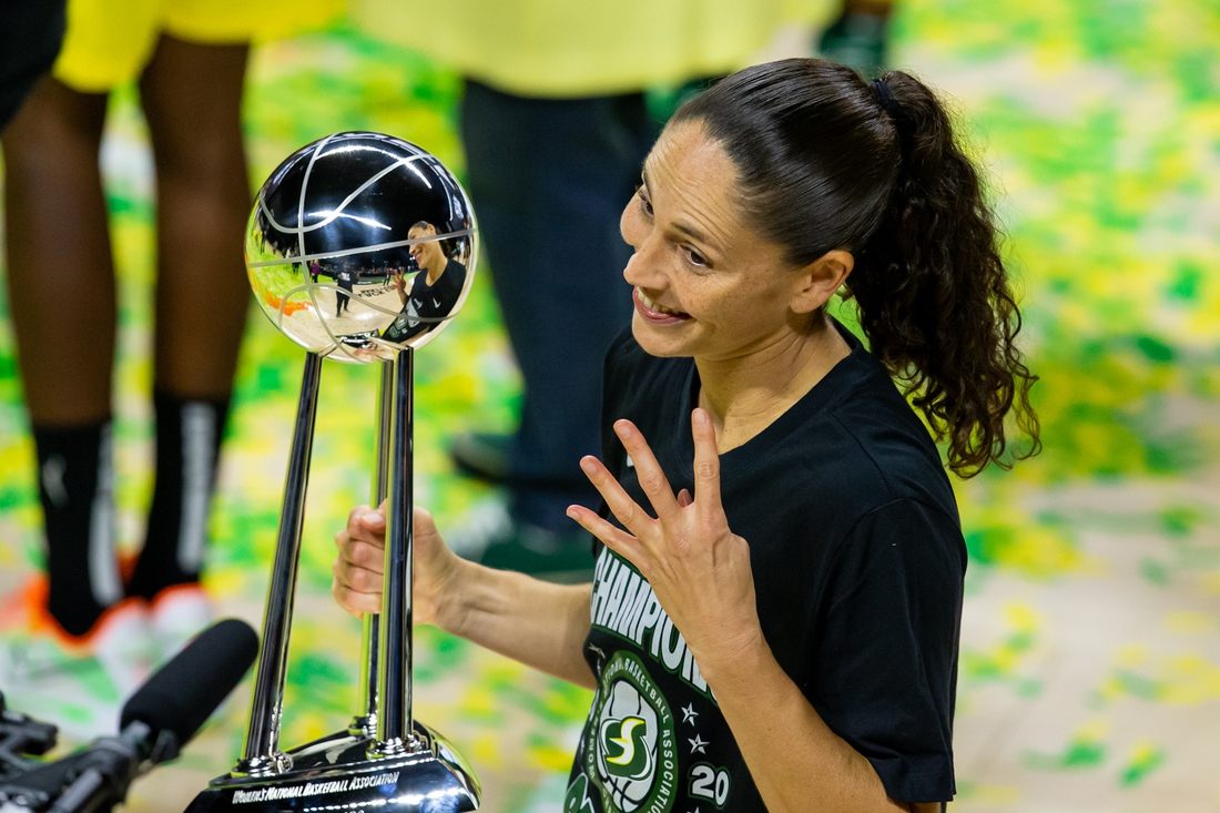 Oct 6, 2020; Bradenton, Florida, USA; Seattle Storm guard Sue Bird (10) poses with the championship trophy after winning the 2020 WNBA Finals at IMG Academy. Mandatory Credit: Mary Holt-USA TODAY Sports