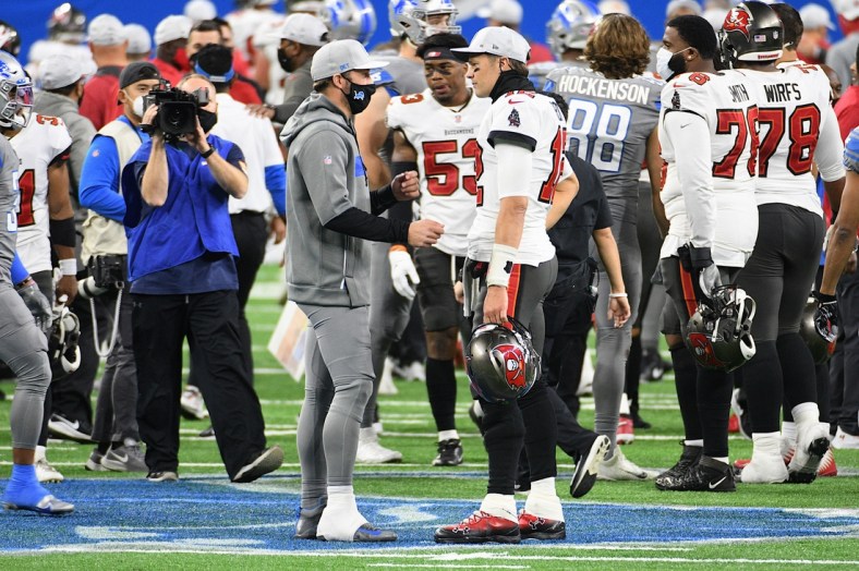 Quarterback Matthew Stafford (file photo) and Tampa Bay Buccaneers quarterback Tom Brady (12) after a 2020 game at Ford Field. Mandatory Credit: Tim Fuller-USA TODAY Sports