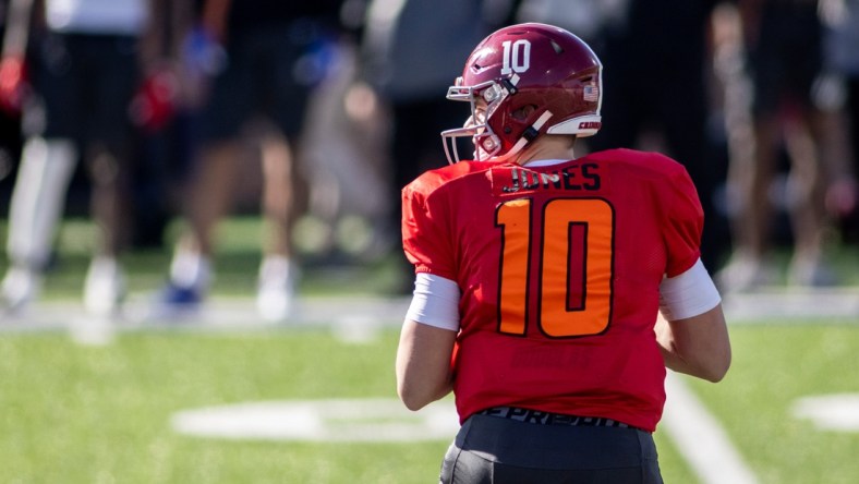 Jan 28, 2021; American quarterback Mac Jones of Alabama (10) looks for a pass opportunity during American practice at Hancock Whitney Stadium in Mobile, Alabama, USA;  Mandatory Credit: Vasha Hunt-USA TODAY Sports