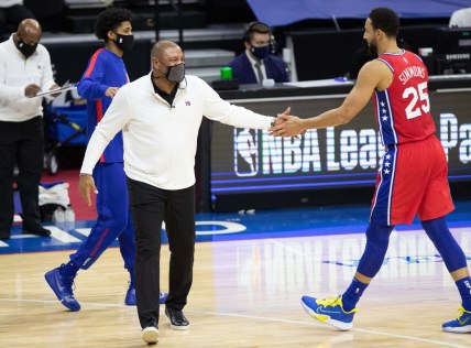 Jan 27, 2021; Philadelphia, Pennsylvania, USA; Philadelphia 76ers guard Ben Simmons (25) and head coach Doc Rivers (L) during the third quarter against the Los Angeles Lakers at Wells Fargo Center. Mandatory Credit: Bill Streicher-USA TODAY Sports