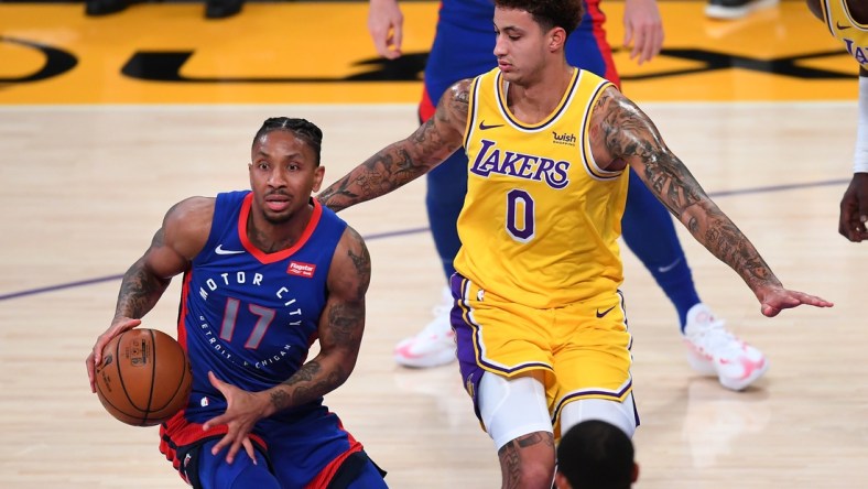 Feb 6, 2021; Los Angeles, California, USA;  Detroit Pistons guard Rodney McGruder (17) controls the ball against Los Angeles Lakers forward Kyle Kuzma (0) in the first half at Staples Center. Mandatory Credit: Jayne Kamin-Oncea-USA TODAY Sports