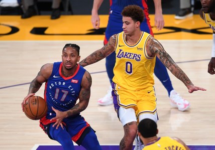 Feb 6, 2021; Los Angeles, California, USA;  Detroit Pistons guard Rodney McGruder (17) controls the ball against Los Angeles Lakers forward Kyle Kuzma (0) in the first half at Staples Center. Mandatory Credit: Jayne Kamin-Oncea-USA TODAY Sports