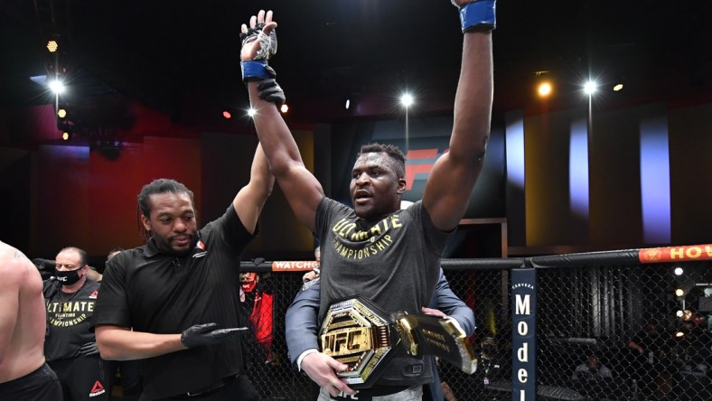 Mar 27, 2021; Las Vegas, NV, USA;  Francis Ngannou of Cameroon reacts after his victory over Stipe Miocic in their UFC heavyweight championship fight during the UFC 260 event at UFC APEX on March 27, 2021 in Las Vegas, Nevada.   Mandatory Credit: Jeff Bottari/Handout Photo via USA TODAY Sports