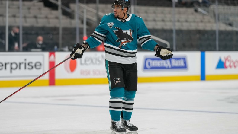 May 7, 2021; San Jose, California, USA; San Jose Sharks left wing Evander Kane (9) reacts during the second period against the Arizona Coyotes at SAP Center at San Jose. Mandatory Credit: Stan Szeto-USA TODAY Sports