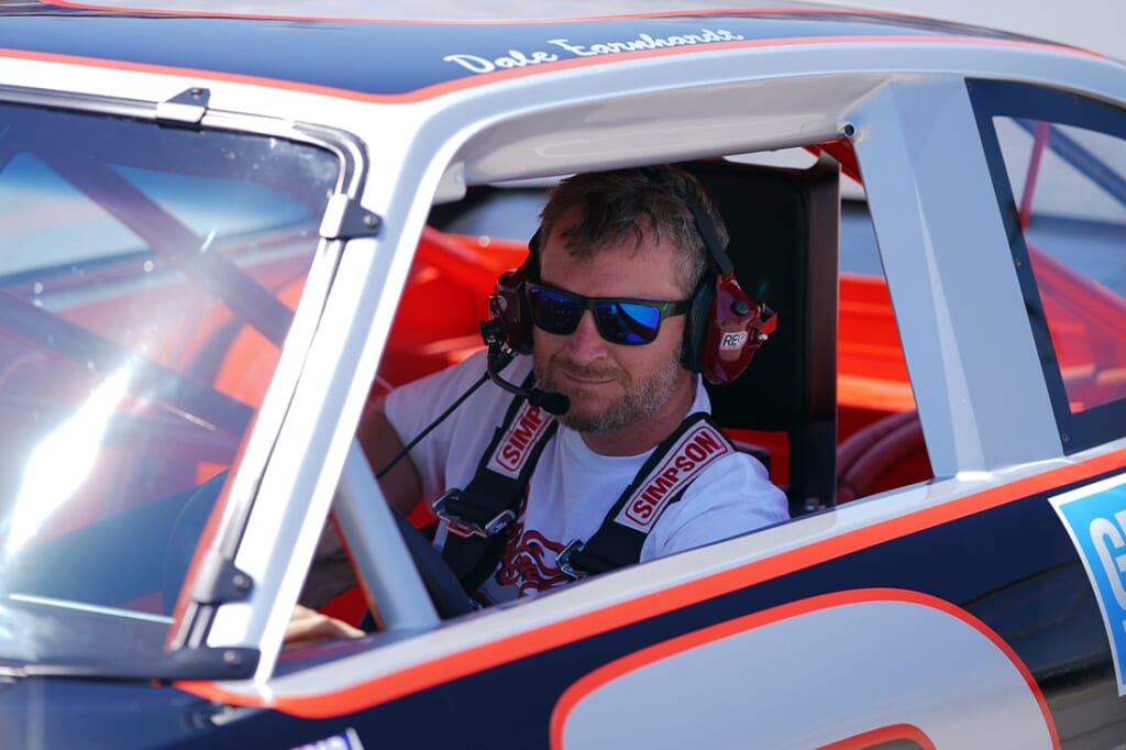 May 8, 2021; Darlington, SC, USA; Former NASCAR driver Dale Earnhardt Jr. sits in the restored 1984 Chevy Nova driven by his father the late Dale Earnhardt Sr. on pit road prior to the Steakhouse Elite 200 at Darlington Raceway. Mandatory Credit: Jasen Vinlove-USA TODAY Sports