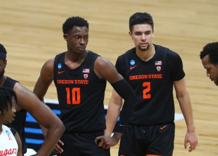 Mar 29, 2021; Indianapolis, Indiana, USA; Oregon State Beavers forward Warith Alatishe (10) and guard Jarod Lucas (2) against the Houston Cougars in the Elite Eight of the 2021 NCAA Tournament at Lucas Oil Stadium. Mandatory Credit: Mark J. Rebilas-USA TODAY Sports