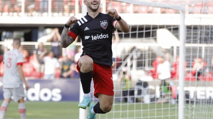 Jul 3, 2021; Washington, DC, USA; D.C. United forward Paul Arriola (7) celebrates after scoring a goal against Toronto FC in the second half at Audi Field. Mandatory Credit: Geoff Burke-USA TODAY Sports