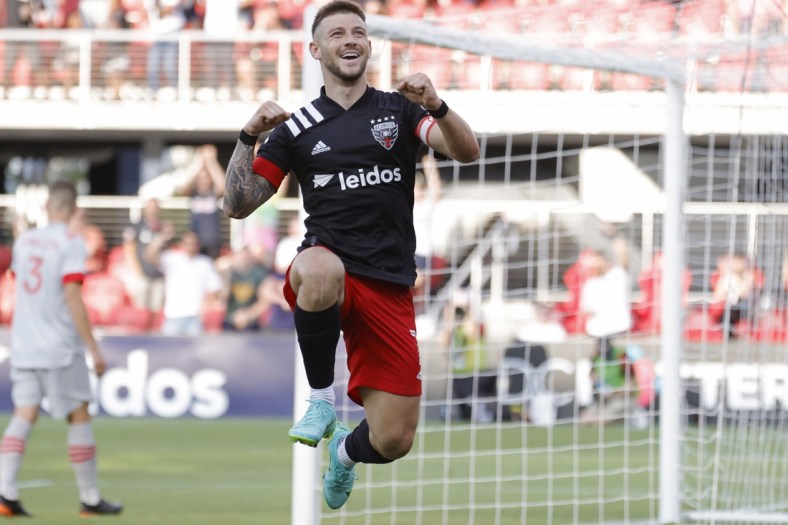 Jul 3, 2021; Washington, DC, USA; D.C. United forward Paul Arriola (7) celebrates after scoring a goal against Toronto FC in the second half at Audi Field. Mandatory Credit: Geoff Burke-USA TODAY Sports