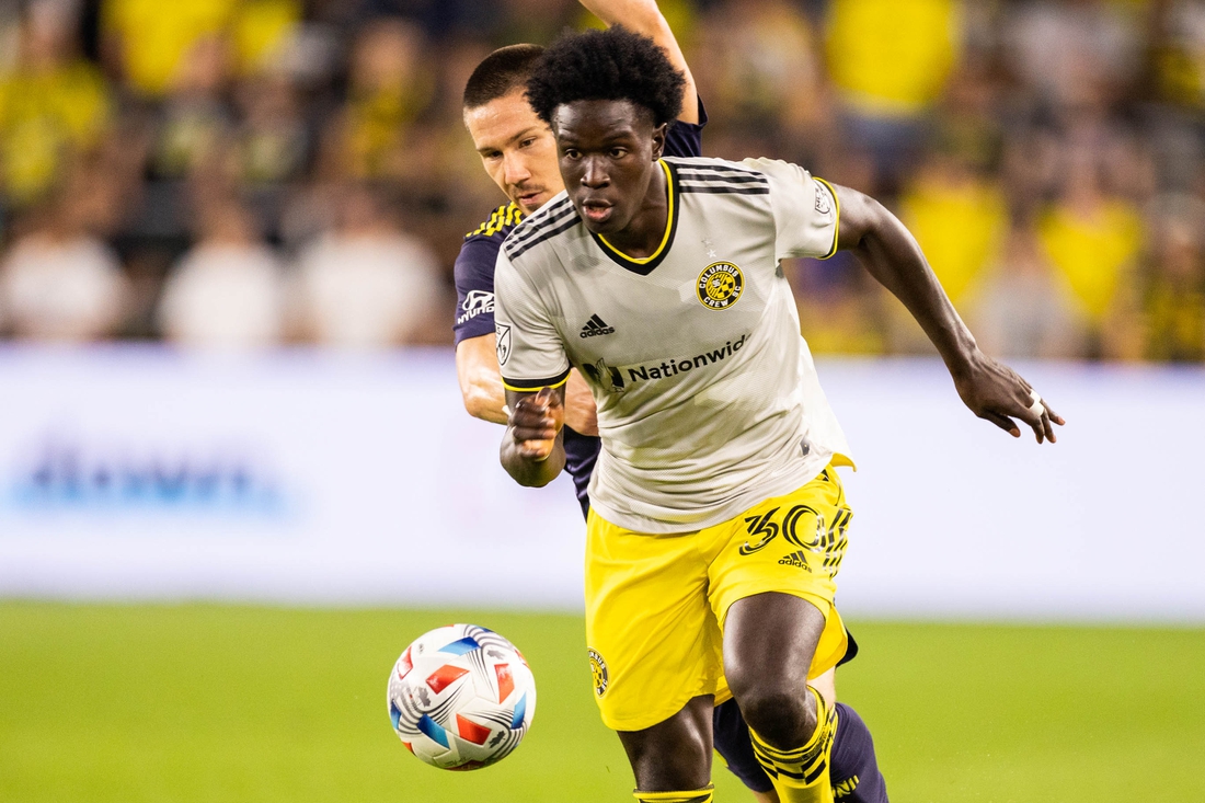 Jul 21, 2021; Columbus, Ohio, USA; Columbus Crew defender Aboubacar Keita (30) dribbles the ball while Nashville SC midfielder Alex Muyl (19) defends in the second half at Lower.com Stadium. Mandatory Credit: Trevor Ruszkowski-USA TODAY Sports