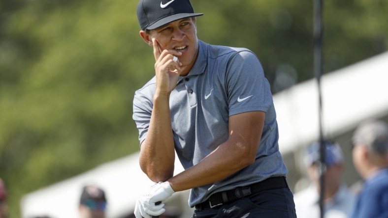 Jul 25, 2021; Blaine, Minnesota, USA; Cameron Champ watches his shot from the 14th tee box during the final round of the 3M Open golf tournament. Mandatory Credit: Bruce Kluckhohn-USA TODAY Sports