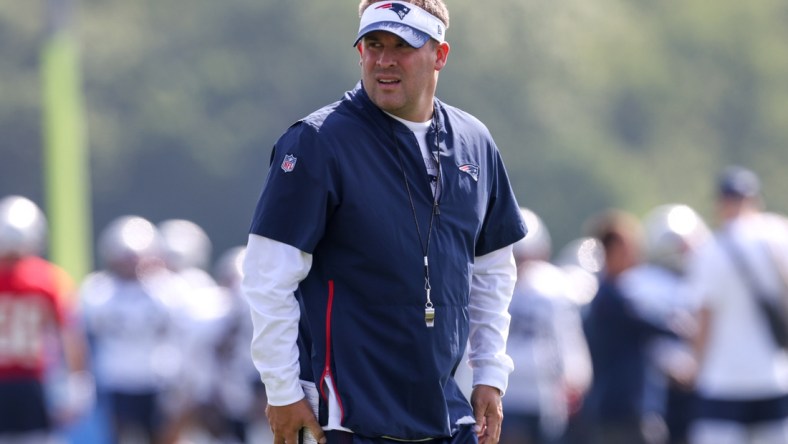 Jul 30, 2021; Foxborough, MA, United States;  New England Patriots offensive coordinator Josh McDaniels reacts during training camp at Gillette Stadium. Mandatory Credit: Paul Rutherford-USA TODAY Sports