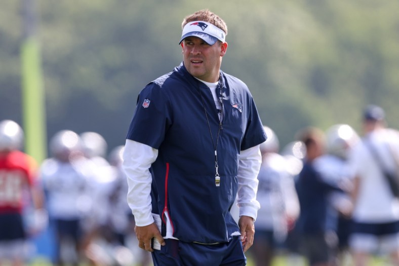 Jul 30, 2021; Foxborough, MA, United States;  New England Patriots offensive coordinator Josh McDaniels reacts during training camp at Gillette Stadium. Mandatory Credit: Paul Rutherford-USA TODAY Sports