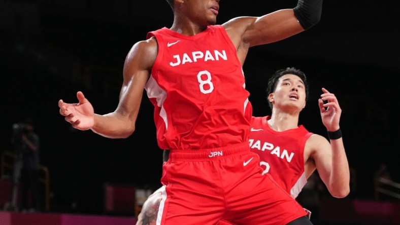 Aug 1, 2021; Saitama, Japan; Japan player Rui Hachimura (8) grabs a rebound while Japan plays Argentina during the Tokyo 2020 Olympic Summer Games at Saitama Super Arena. Mandatory Credit: Kareem Elgazzar-USA TODAY Sports