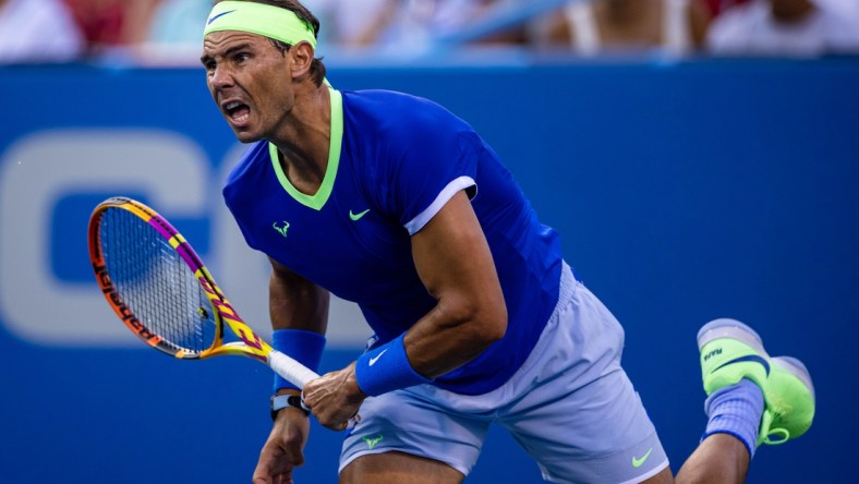 Aug 5, 2021; Washington, DC, USA; Rafael Nadal of Spain serves to Lloyd Harris of South Africa (not pictured) during the Citi Open at Rock Creek Park Tennis Center. Mandatory Credit: Scott Taetsch-USA TODAY Sports