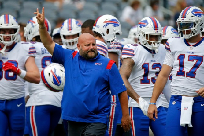 Aug 21, 2021; Chicago, Illinois, USA; Buffalo Bills offensive coordinator Brian Daboll gestures during warmups before the game against the Chicago Bears at Soldier Field. The Buffalo Bills won 41-15. Mandatory Credit: Jon Durr-USA TODAY Sports