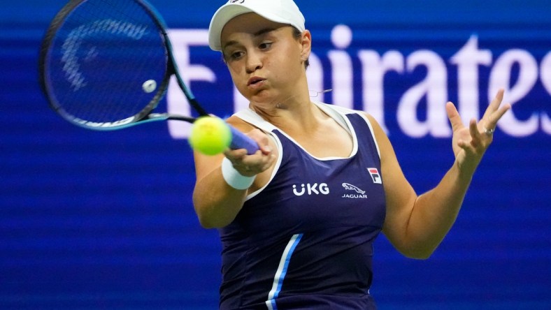 Sep 4, 2021; Flushing, NY, USA; 
Ashleigh Barty of Australia hits to Shelby Rogers of the USA on day six of the 2021 U.S. Open tennis tournament at USTA Billie Jean King National Tennis Center. Mandatory Credit: Robert Deutsch-USA TODAY Sports