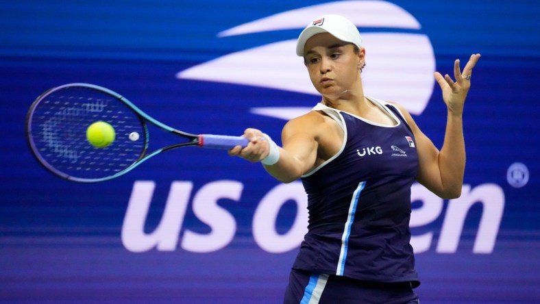 Sep 4, 2021; Flushing, NY, USA; 
Ashleigh Barty of Australia hits to Shelby Rogers of the USA on day six of the 2021 U.S. Open tennis tournament at USTA Billie Jean King National Tennis Center. Mandatory Credit: Robert Deutsch-USA TODAY Sports