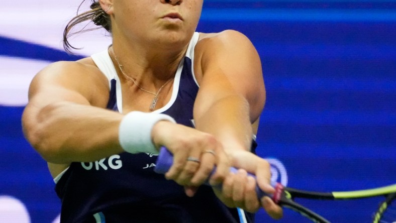 Sep 4, 2021; Flushing, NY, USA; 
Ashleigh Barty of Australia hits to Shelby Rogers of the USA on day six of the 2021 U.S. Open tennis tournament at USTA Billie Jean King National Tennis Center. Mandatory Credit: Robert Deutsch-USA TODAY Sports