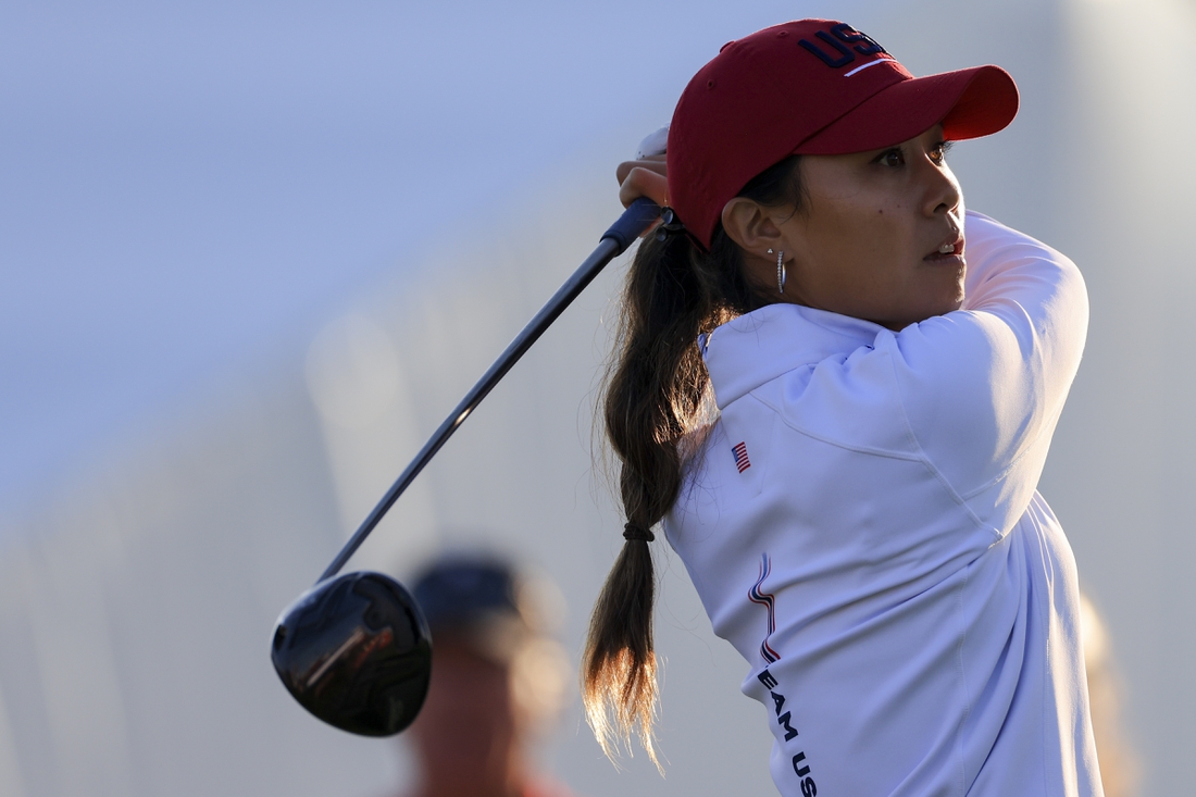 Sep 5, 2021; Toledo, Ohio, USA; Danielle Kang of Team USA watches her tee shot on the sixth hole during competition rounds of the Solheim Cup golf tournament at Inverness Club. Mandatory Credit: Aaron Doster-USA TODAY Sports