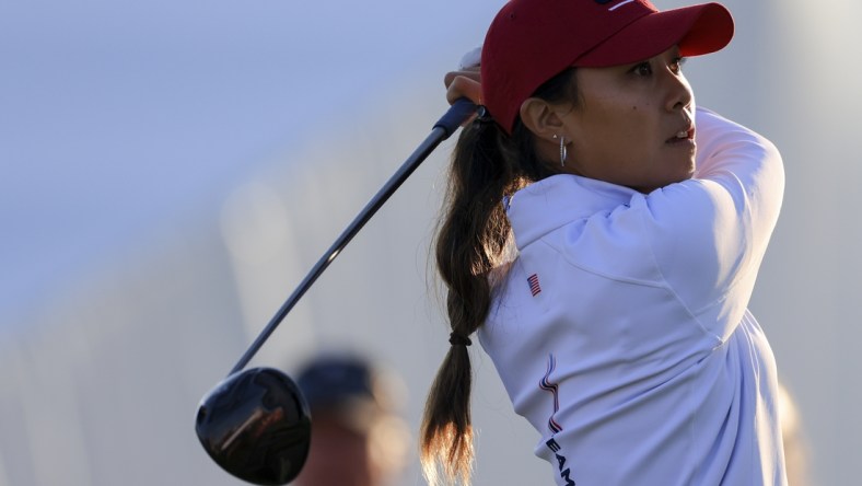 Sep 5, 2021; Toledo, Ohio, USA; Danielle Kang of Team USA watches her tee shot on the sixth hole during competition rounds of the Solheim Cup golf tournament at Inverness Club. Mandatory Credit: Aaron Doster-USA TODAY Sports