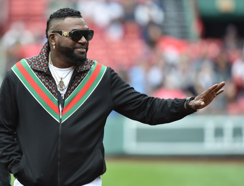 Sep 5, 2021; Boston, Massachusetts, USA; Former Boston Red Sox player David Ortiz waves to the crowd prior to a game against the Cleveland Indians at Fenway Park. Mandatory Credit: Bob DeChiara-USA TODAY Sports
