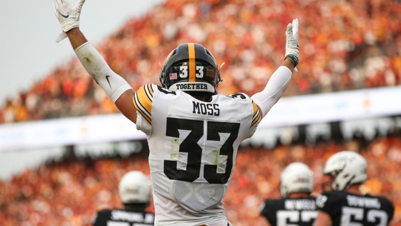 Sep 11, 2021; Ames, Iowa, USA; Iowa Hawkeyes defensive back Riley Moss (33) celebrates after a Hawkeyes touchdown against the Iowa State Cyclones in the third quarter at Jack Trice Stadium. The Hawkeyes won 27-17.  Mandatory Credit: Reese Strickland-USA TODAY Sports