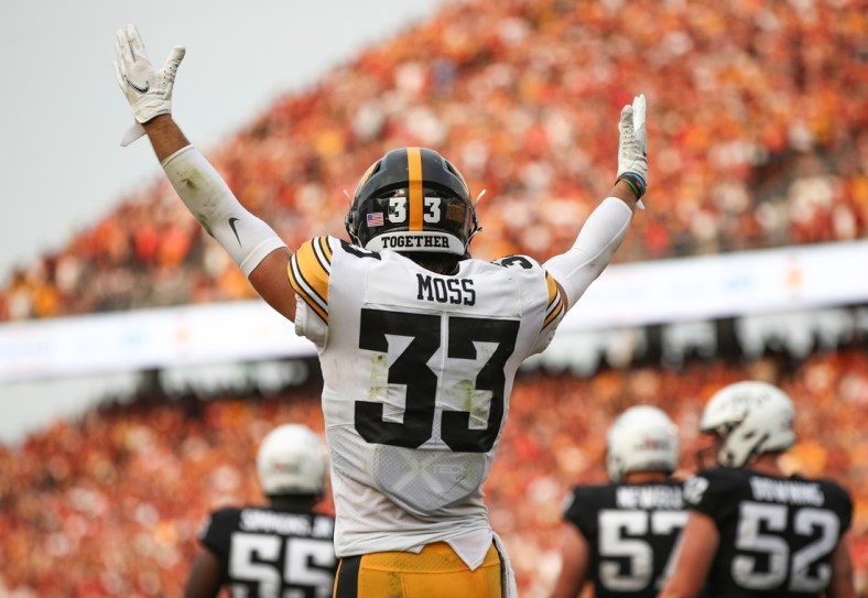 Sep 11, 2021; Ames, Iowa, USA; Iowa Hawkeyes defensive back Riley Moss (33) celebrates after a Hawkeyes touchdown against the Iowa State Cyclones in the third quarter at Jack Trice Stadium. The Hawkeyes won 27-17.  Mandatory Credit: Reese Strickland-USA TODAY Sports