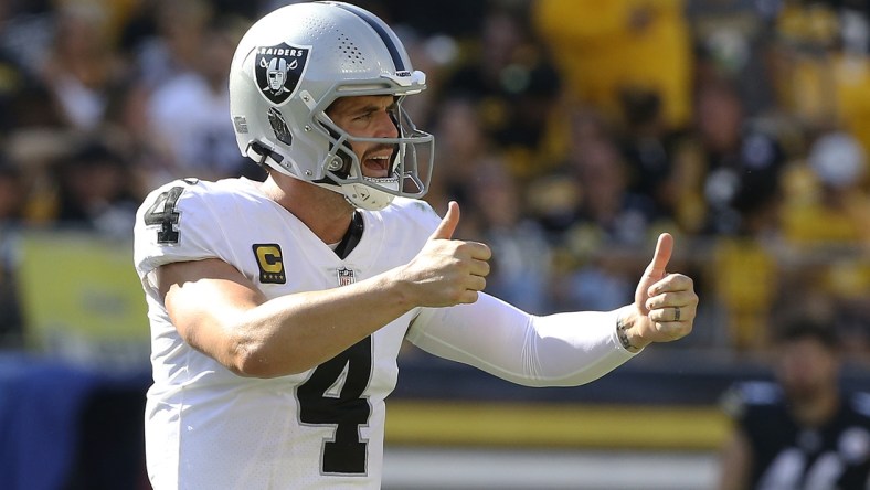 Sep 19, 2021; Pittsburgh, Pennsylvania, USA;  Las Vegas Raiders quarterback Derek Carr (4) gestures on the field against the Pittsburgh Steelers during the fourth quarter at Heinz Field. Las Vegas won 26-17. Mandatory Credit: Charles LeClaire-USA TODAY Sports