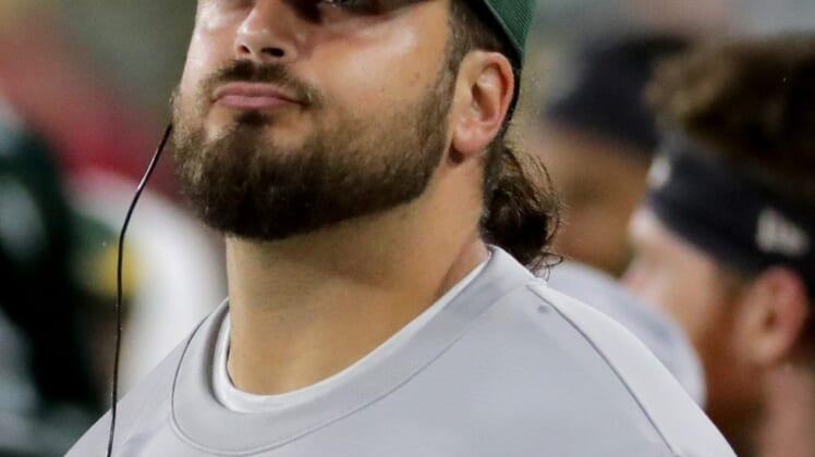 Injured Green Bay Packers offensive tackle David Bakhtiari is shown during the fourth quarter of their game Monday, September 20, 2021 at Lambeau Field in Green Bay, Wis. The Green Bay Packers beat the Detroit Lions 35-17.Packers21 19