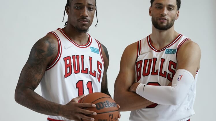 Sep 27, 2021; Chicago, Illinois, USA; Chicago Bulls guard Zach LaVine (8) and forward DeMar DeRozan (11) pose for photos during Chicago Bulls Media Day at the United Center. Mandatory Credit: David Banks-USA TODAY Sports